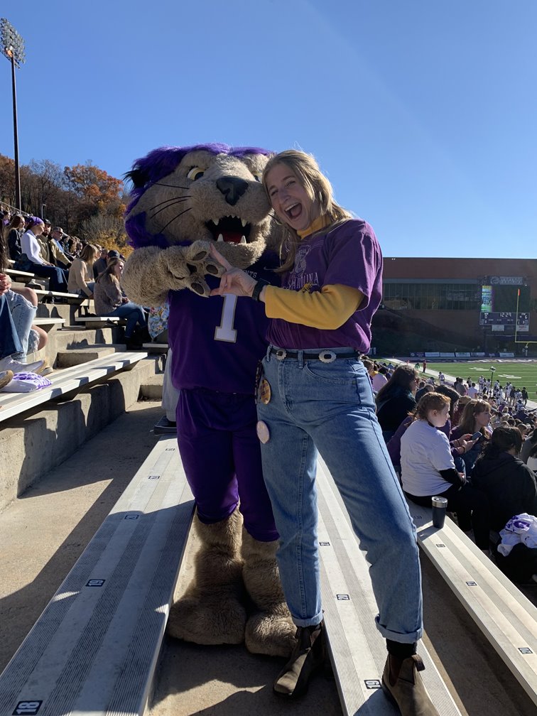 Kinley with a mascot